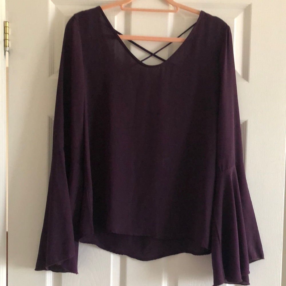 Bell sleeved open back blouse
